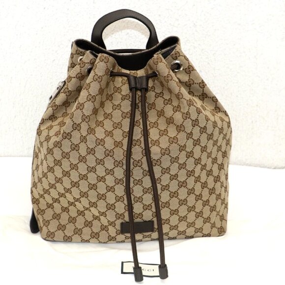 Gucci Handbags - Gucci Drawstring Backpack GG Canvas Medium Brown 449175-527066
